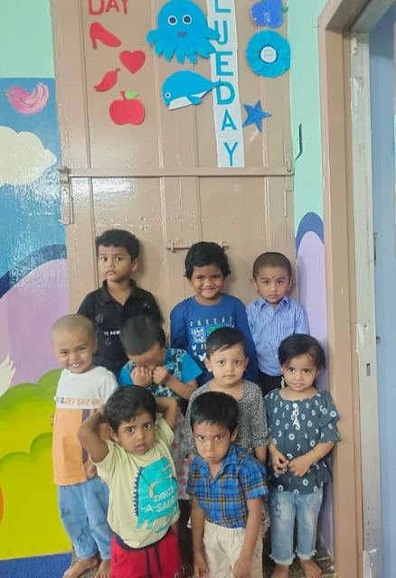 Children celebrating a themed day event at Kids Kingdom Playschool