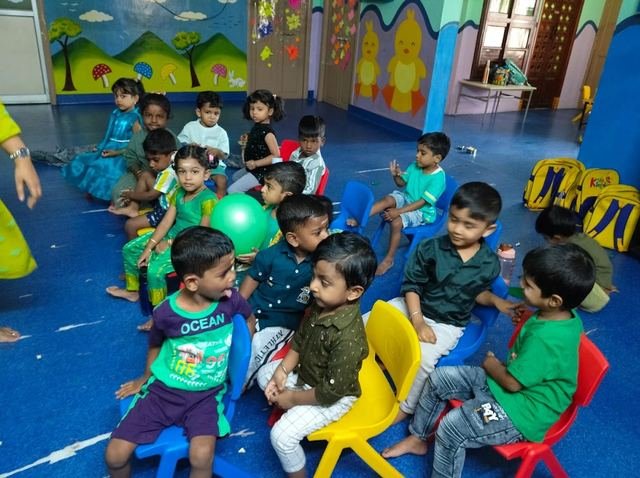 Circle time storytelling activity with children at Kids Kingdom Playschool